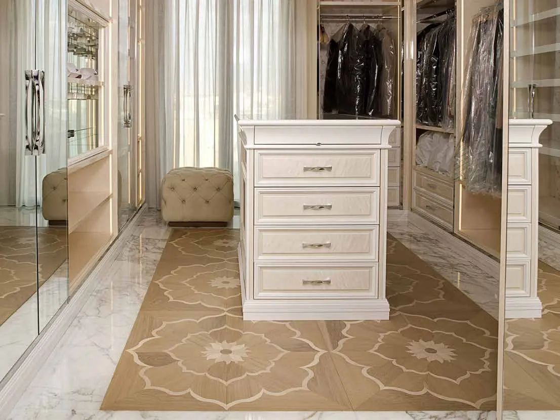 Walk-in closet with floral wood and marble inlay