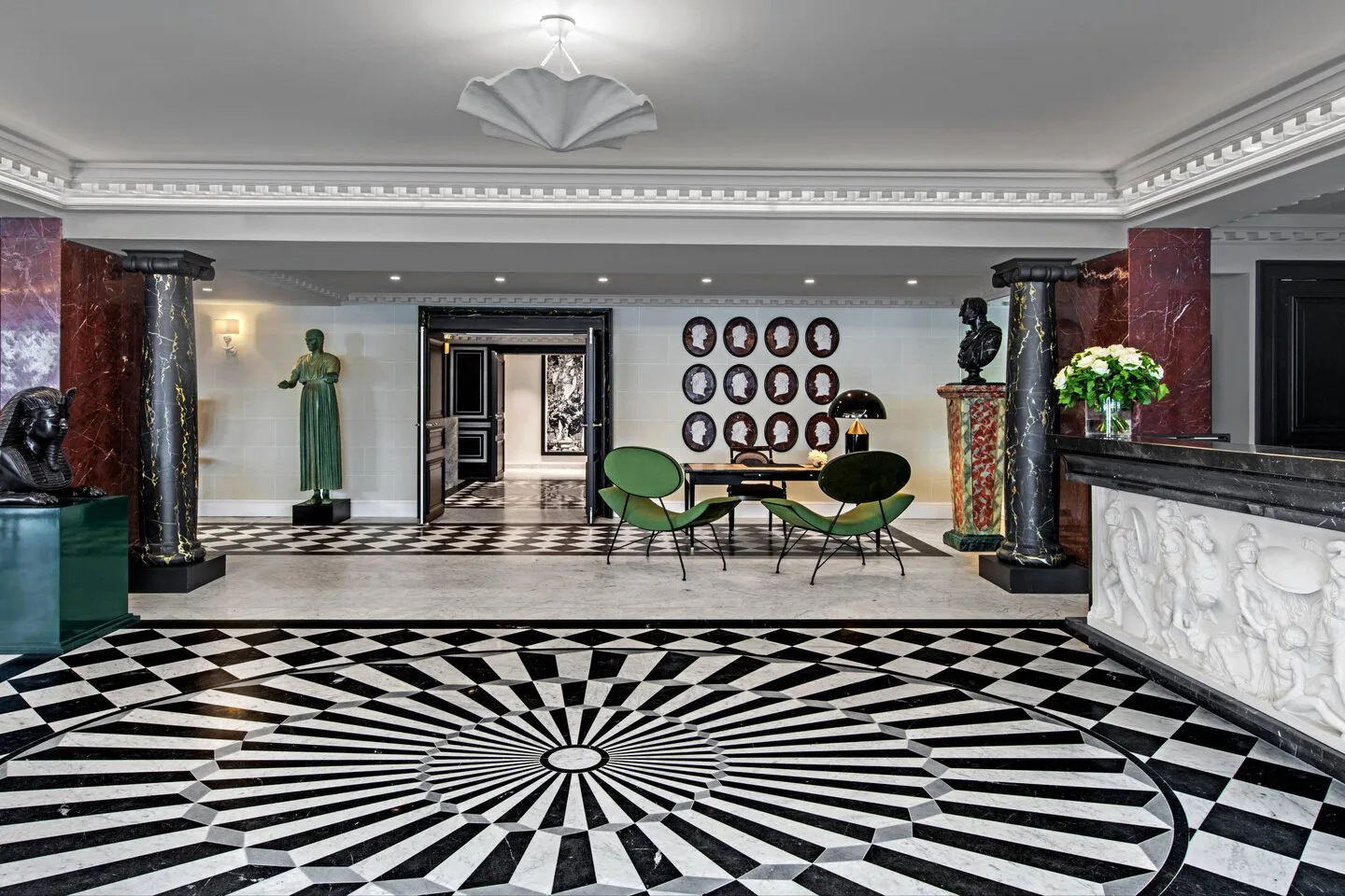 Hotel de Berry Paris lobby with a radial black and white marble floor
