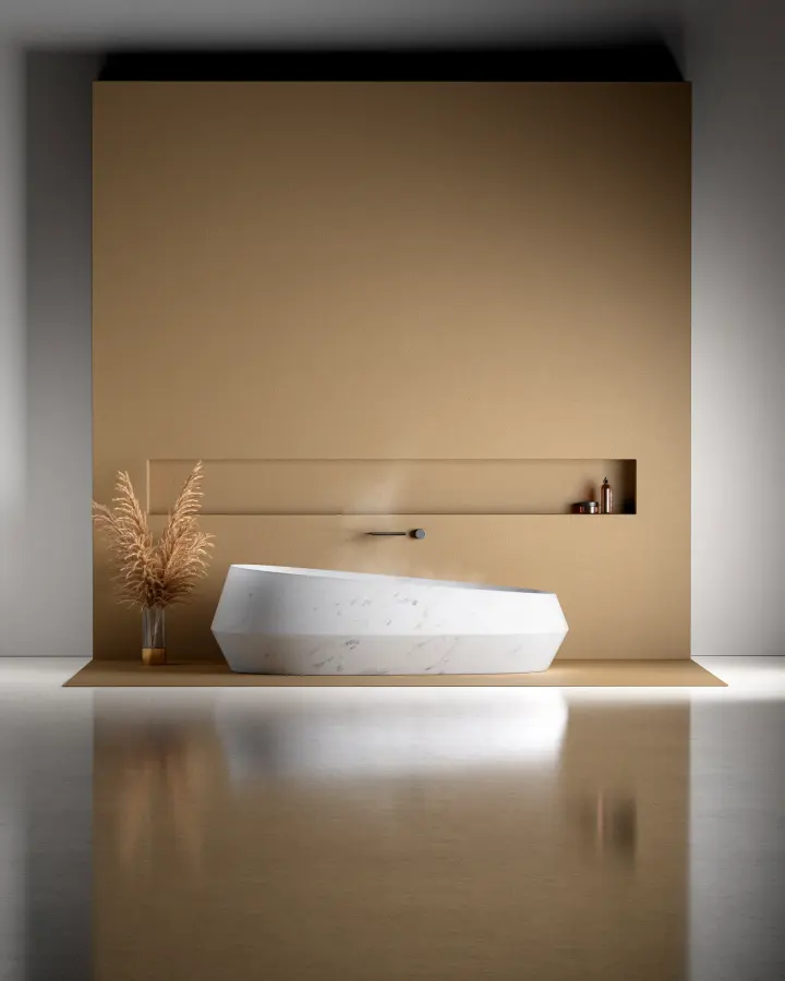 Marble bathtub in a bathroom with a warm gold wall